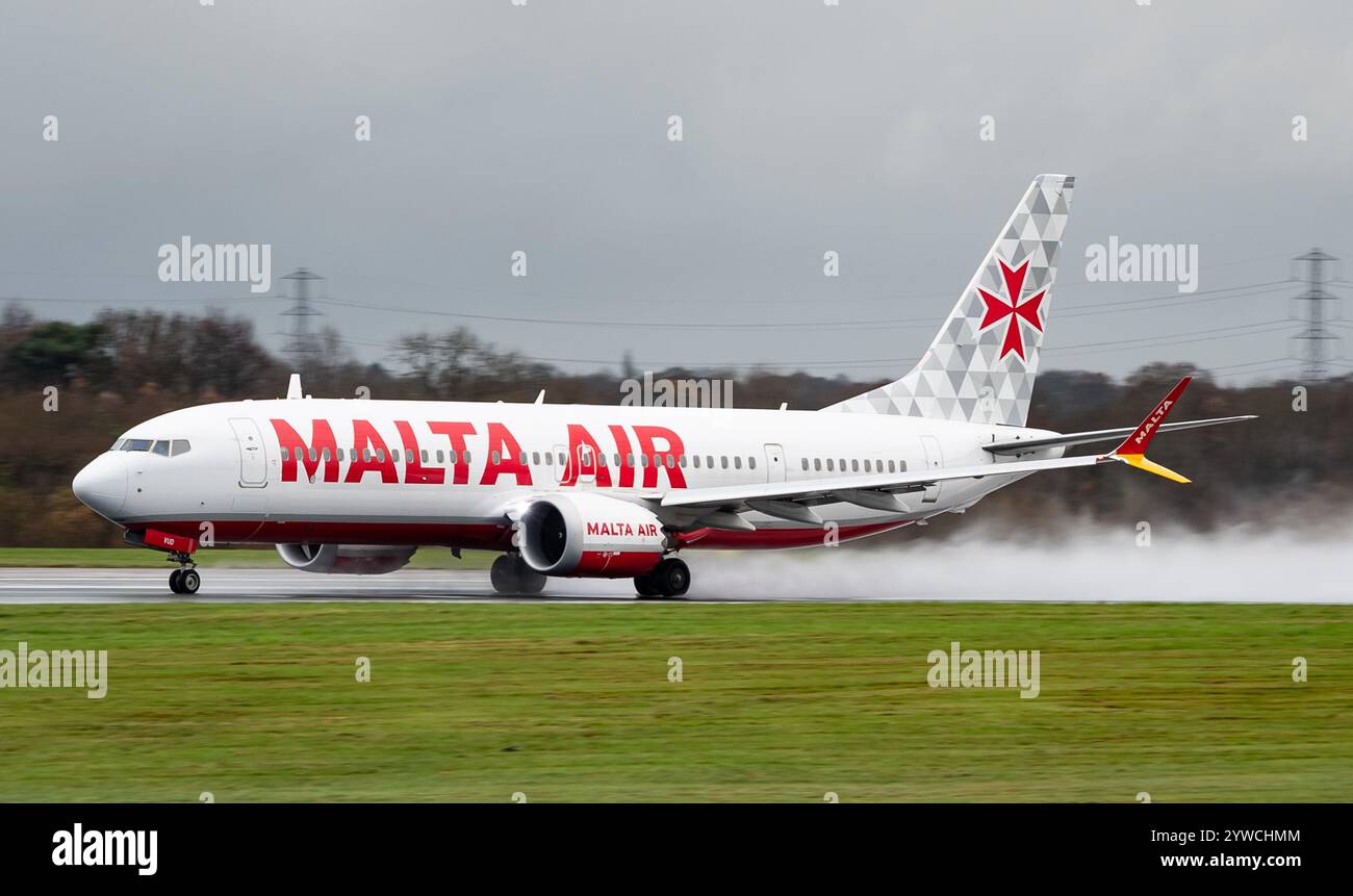 Malta Air Boeing 737-8 MAX 200 9H-VUD takes off at Manchester Airport, Monday 2nd December 2024. Credit JTW Aviation Images / Alamy. Stock Photo