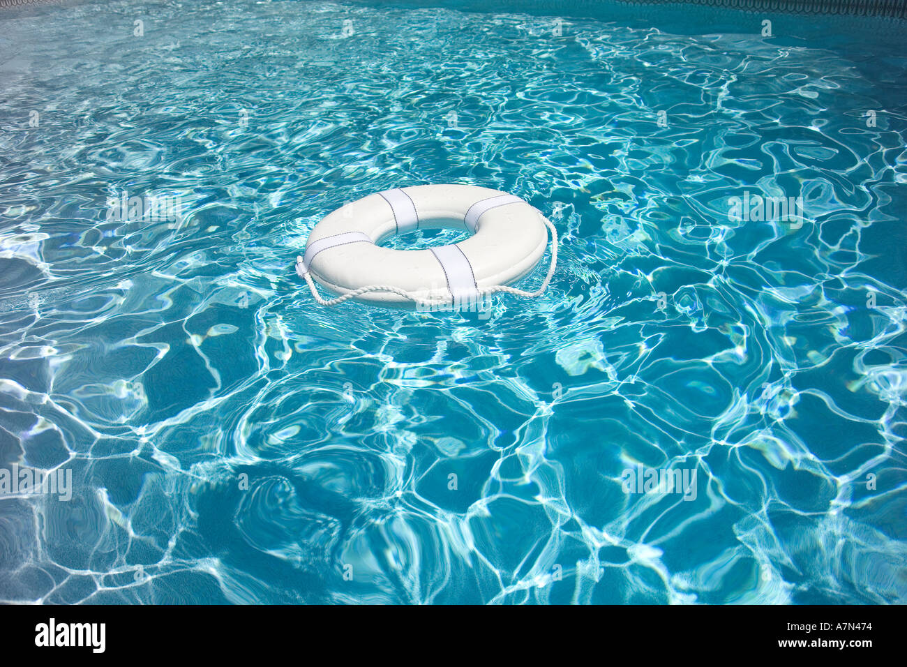 Life Preserver in pool life jacket Stock Photo