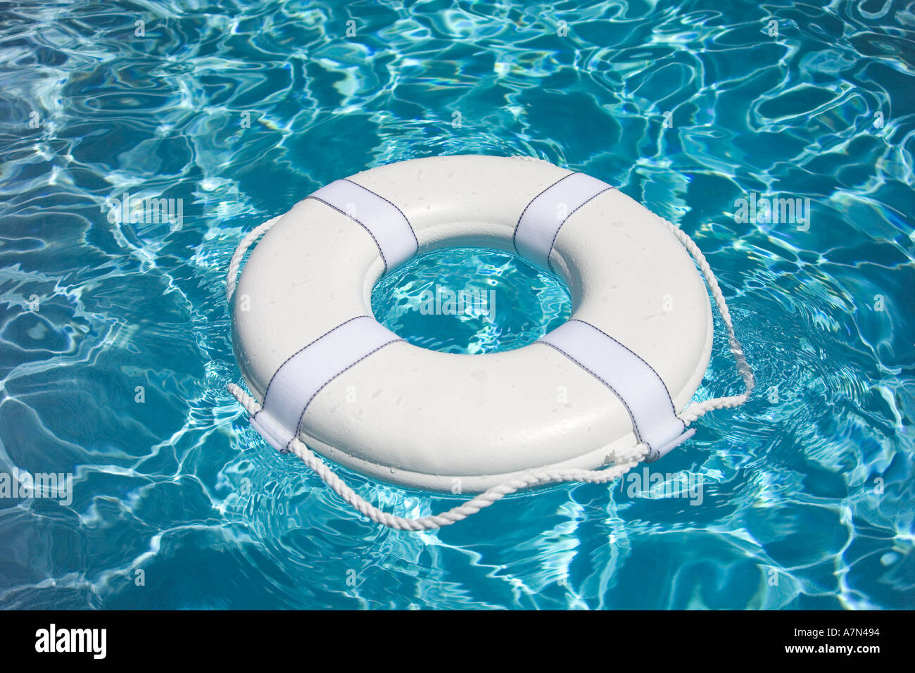 Life Preserver in pool life jacket Stock Photo