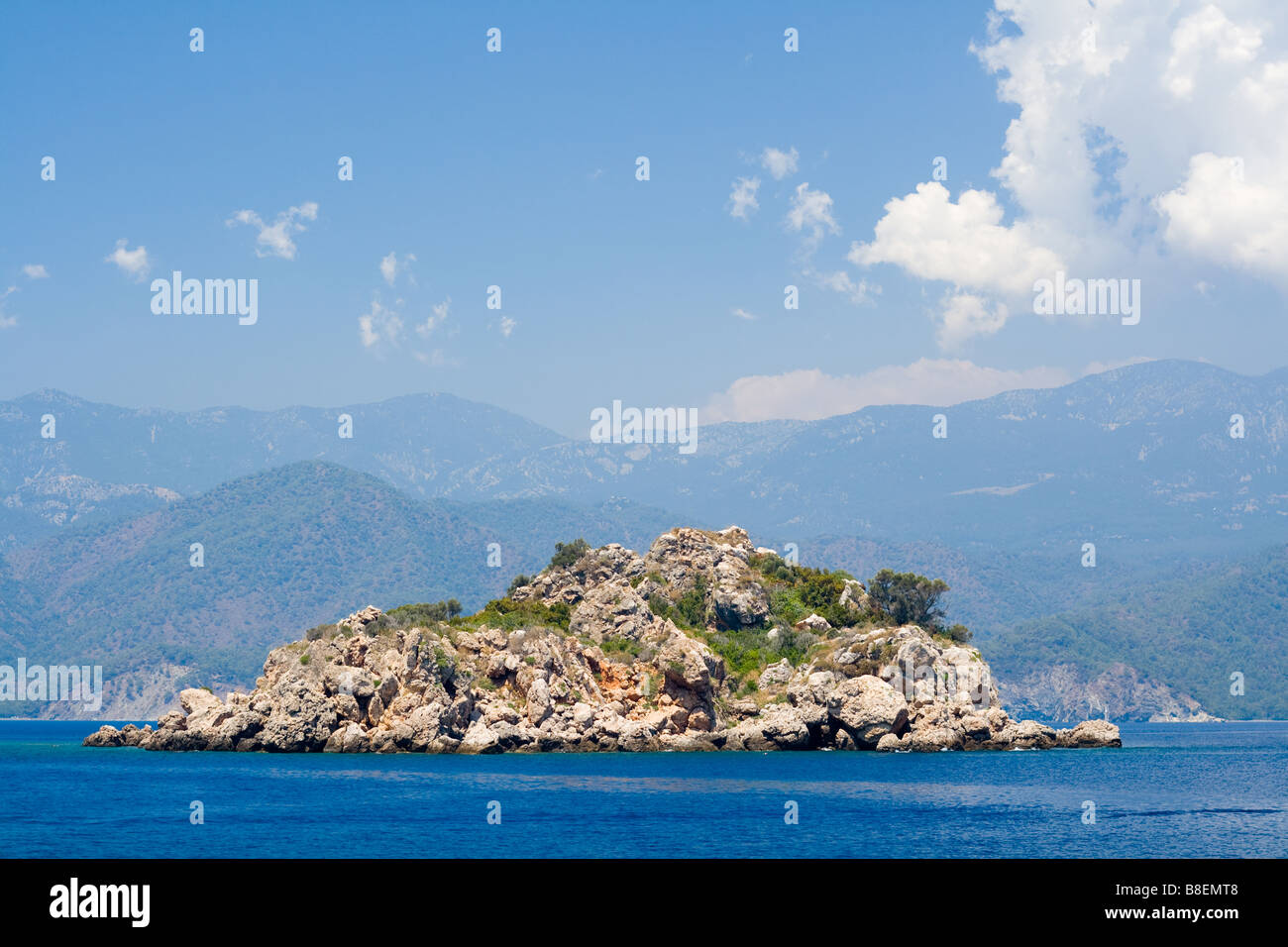 Mountain island in a sea Stock Photo