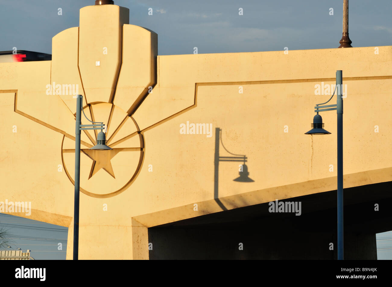 Column of new Mill Avenue Bridge with Arizona state flag star and street lights Stock Photo