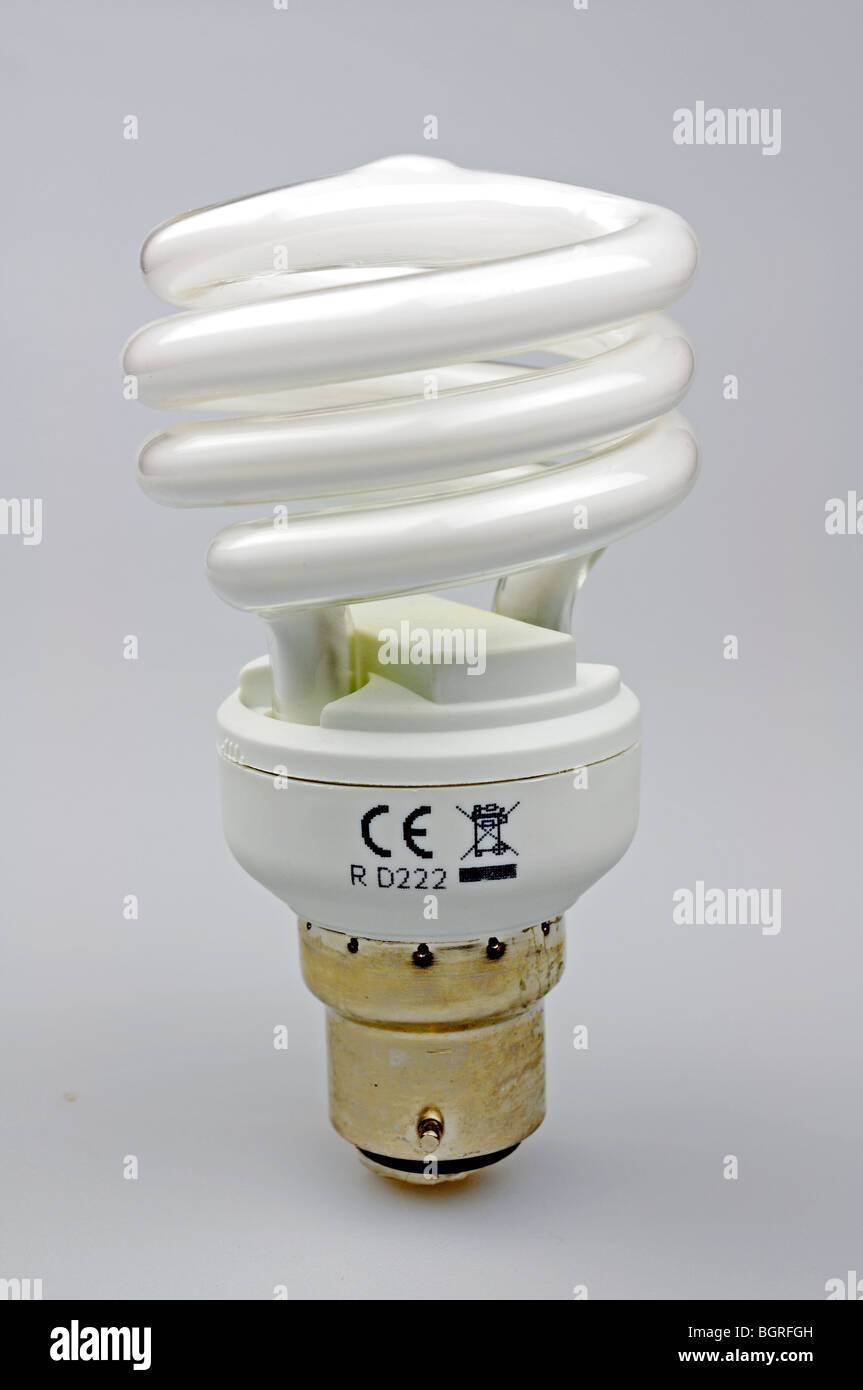 a spiral energy saving light bulb on a white background Stock Photo