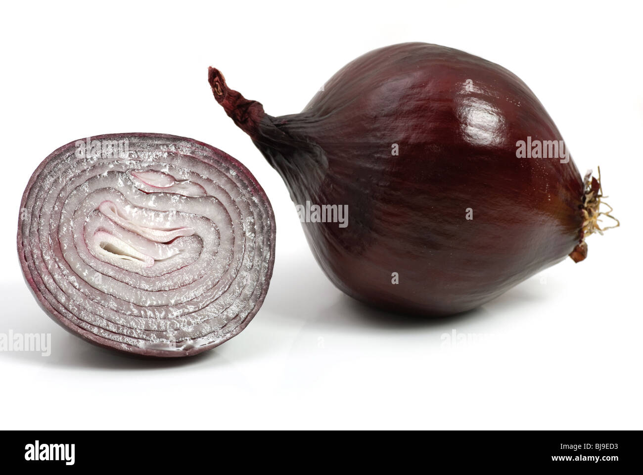 Red onion and a half isolated over white Stock Photo