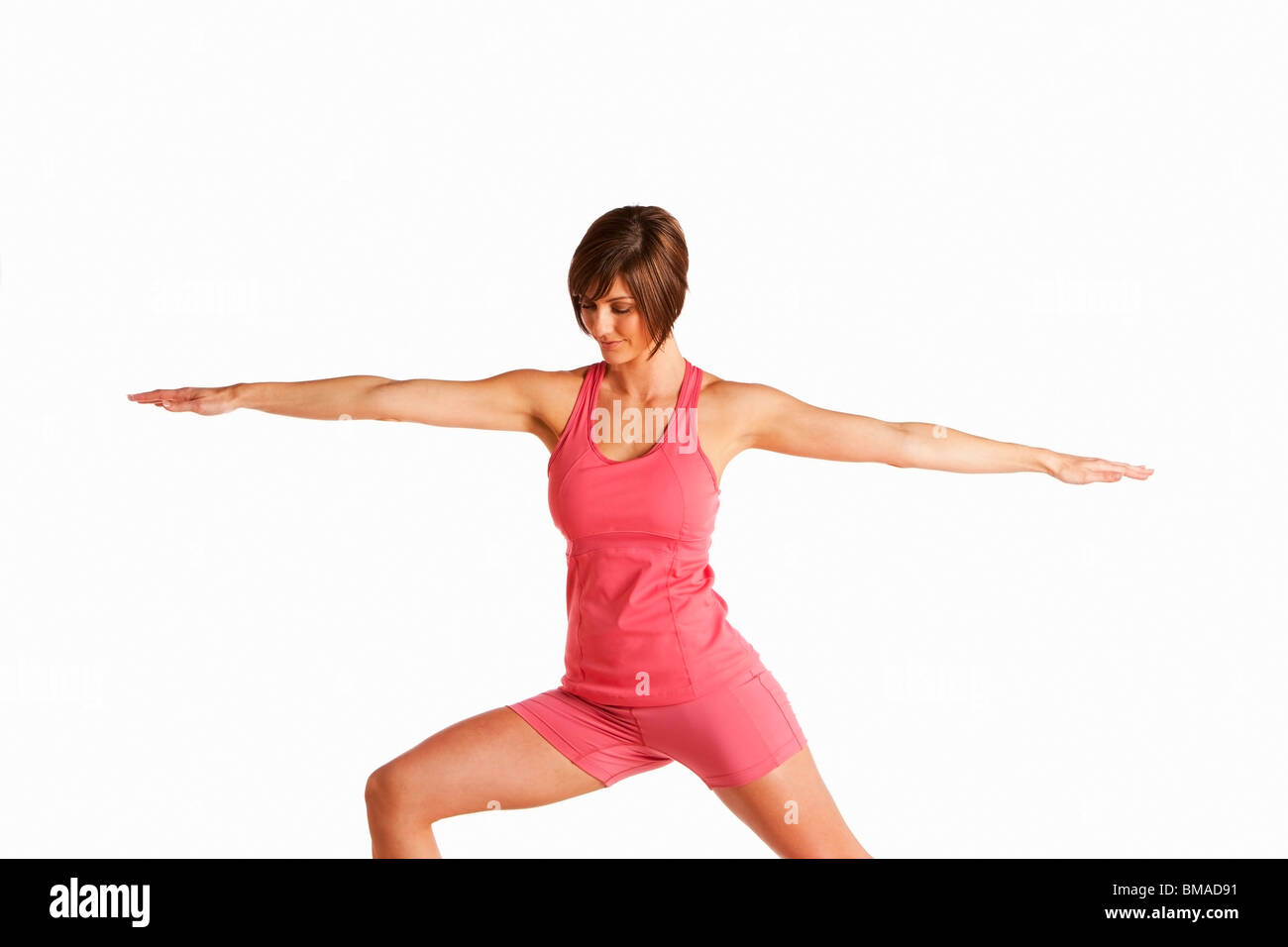 Woman Exercising in Studio Stock Photo