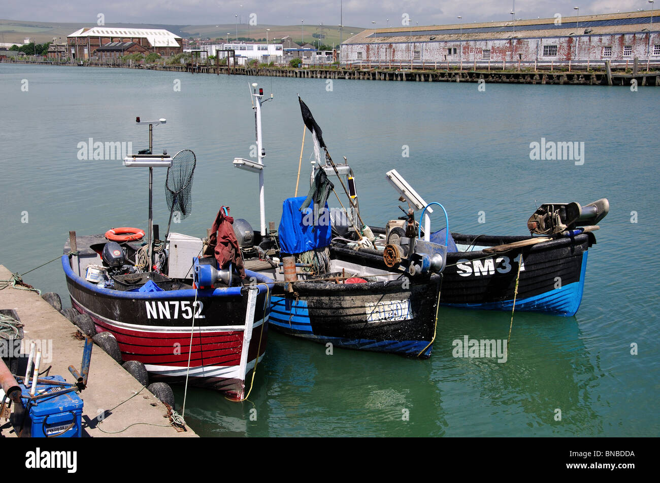 Fishing boats in harbour, West Quay, Newhaven, Lewes District, East Sussex, England, United Kingdom Stock Photo