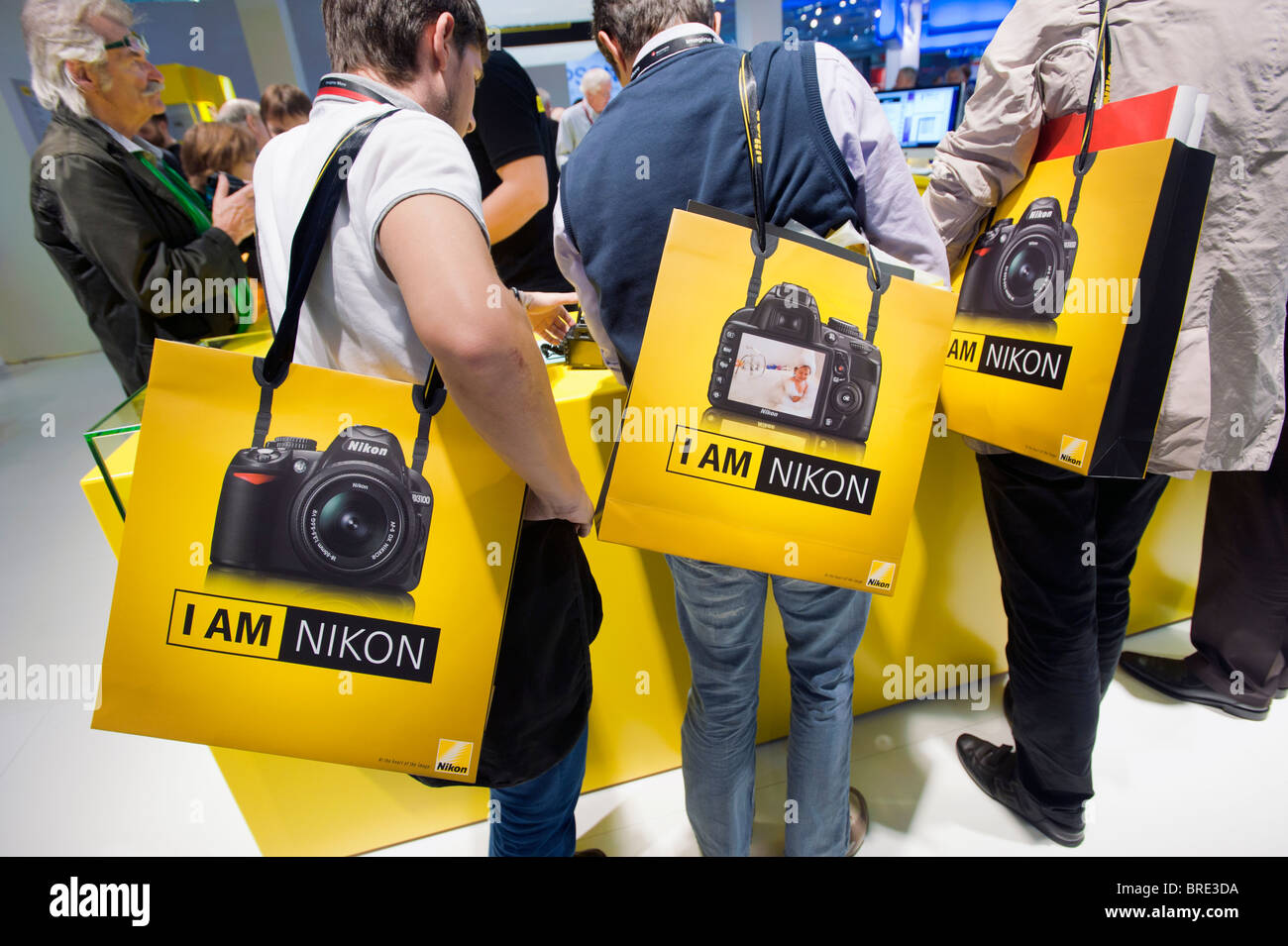 Many people at Nikon stand at Photokina digital imaging trade show in Cologne Germany Stock Photo