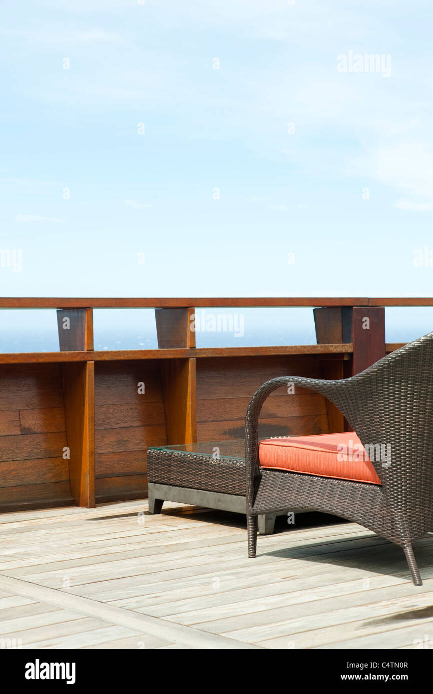 Wicker patio furniture on deck Stock Photo