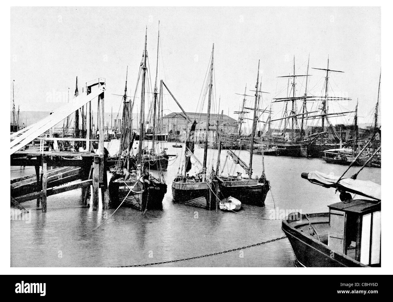 Newhaven town East Sussex England ferry port harbour freight dock fishing fleet vessel mast sailing sail cargo merchant Stock Photo