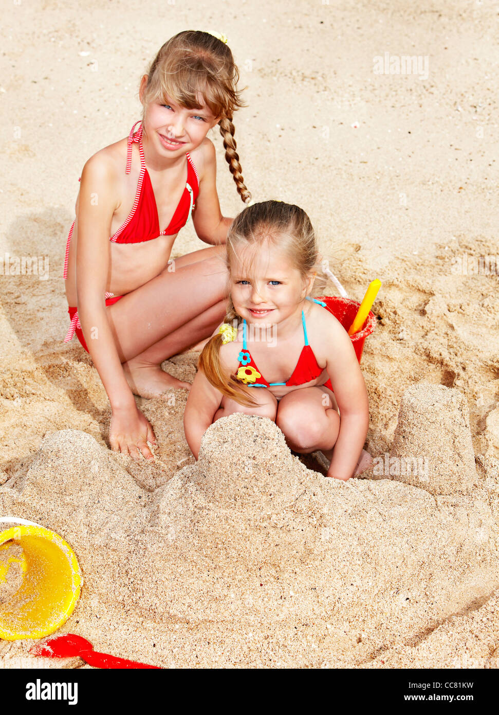 Little girl  playing in sand. Stock Photo