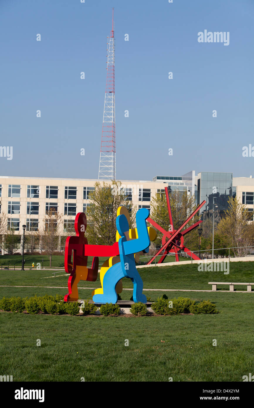 An untitled sculptre (Three Dancing Figures, version C) made by Keith Haring at the Pappa John Sculpture Park, Des Monies, Iowa Stock Photo