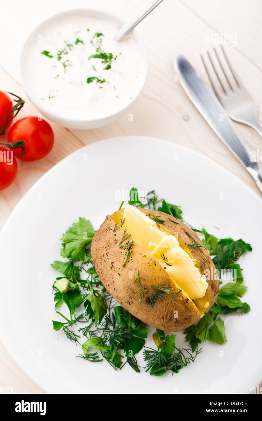 Baked potato with butter Stock Photo