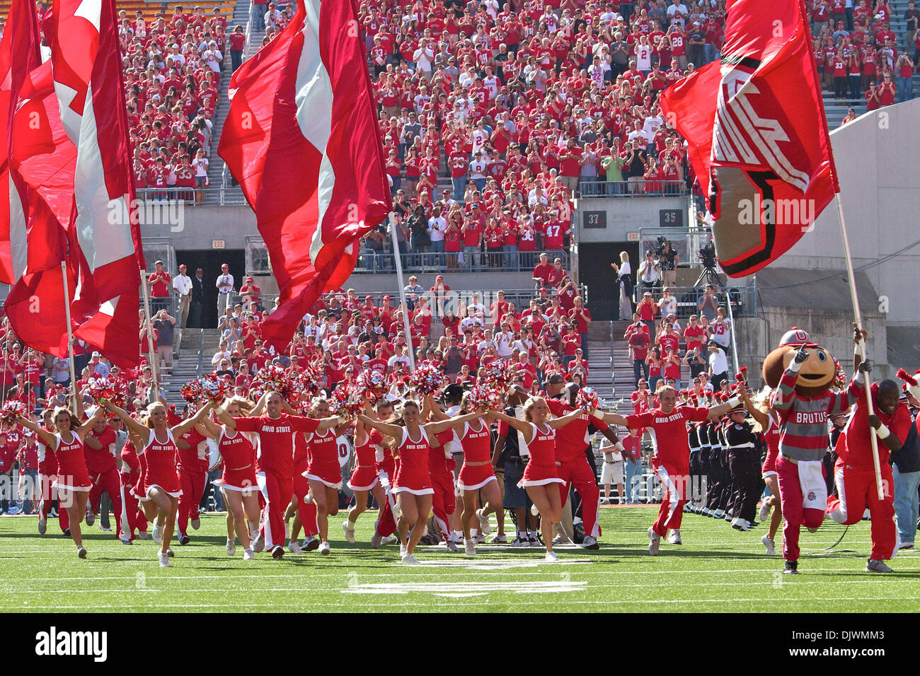 Oct. 9, 2010 - Columbus, Ohio, United States of America - Ohio State mascot Brutus and cheerleaders lead the team onto the field prior to the game between Indiana and Ohio State at Ohio Stadium, Columbus, Ohio. Ohio State defeated Indiana 38-10. (Credit Image: © Scott Stuart/Southcreek Global/ZUMApress.com) Stock Photo