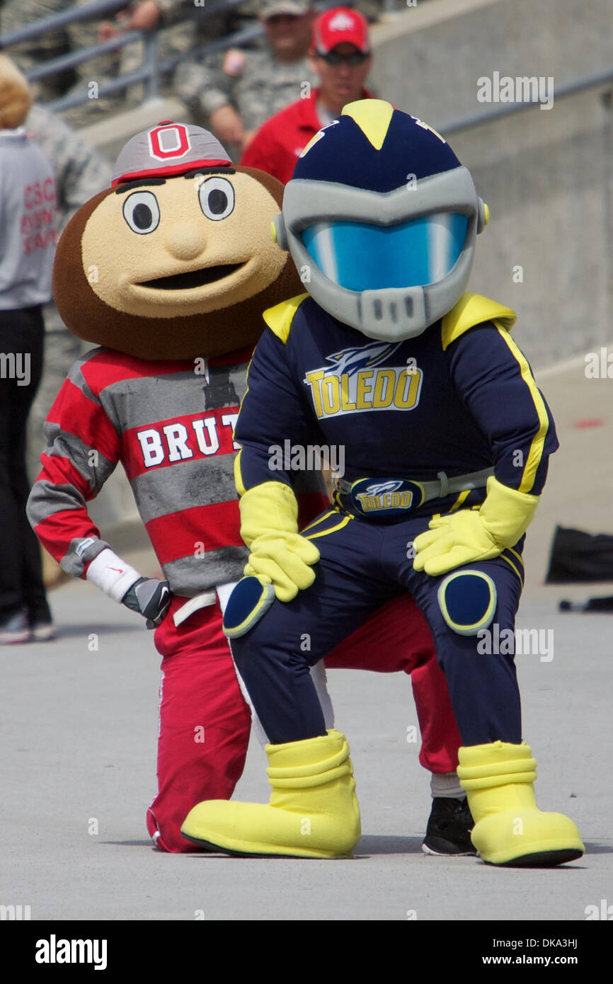 Sept. 10, 2011 - Columbus, Ohio, U.S - Ohio State Buckeyes mascot Brutus and Toledo Rockets mascot Rocky the Rocket take a break during the game between Toledo and Ohio State at Ohio Stadium, Columbus, Ohio. Ohio State defeated Toledo 27-22. (Credit Image: © Scott Stuart/Southcreek Global/ZUMAPRESS.com) Stock Photo