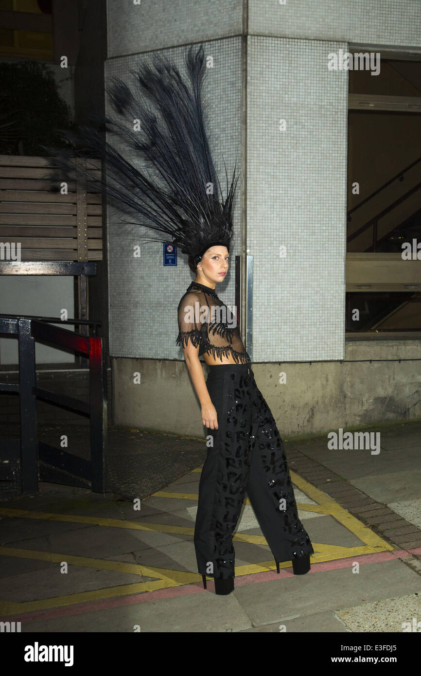 Lady Gaga leaves the ITV studios wearing a large black feathered head dress after appearing on the Graeme Norton show  Featuring: Lady Gaga Where: London, United Kingdom When: 29 Oct 2013 Stock Photo