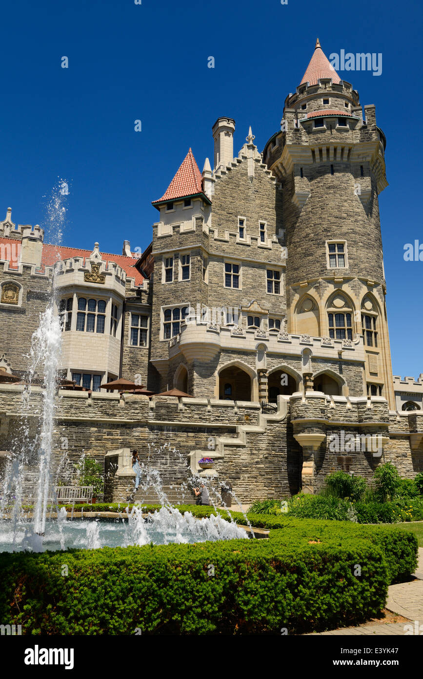 Garden fountain and Gothic revival towers of Casa Loma castle in Toronto in summer Stock Photo