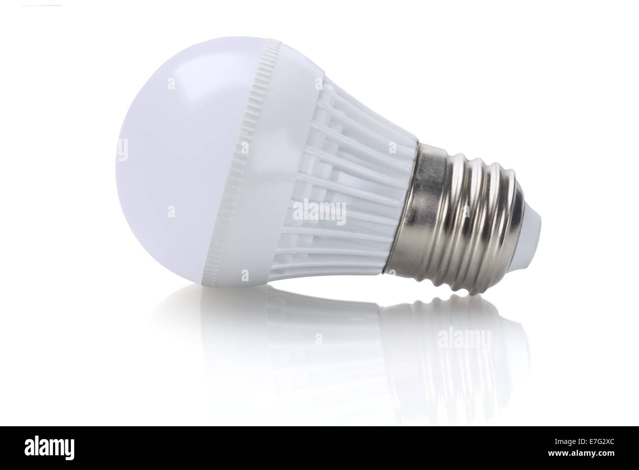 LED Light Bulb Lying On White Background Stock Photo