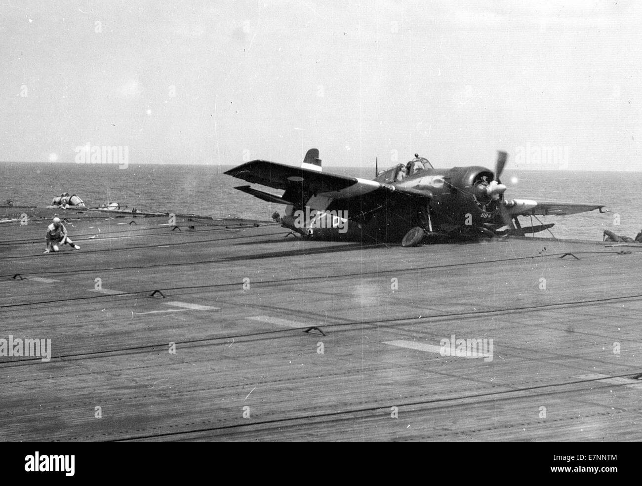 Royal Navy Grumman Martlet later called Wildcat aircraft crashes on the flight deck during WW11 Stock Photo