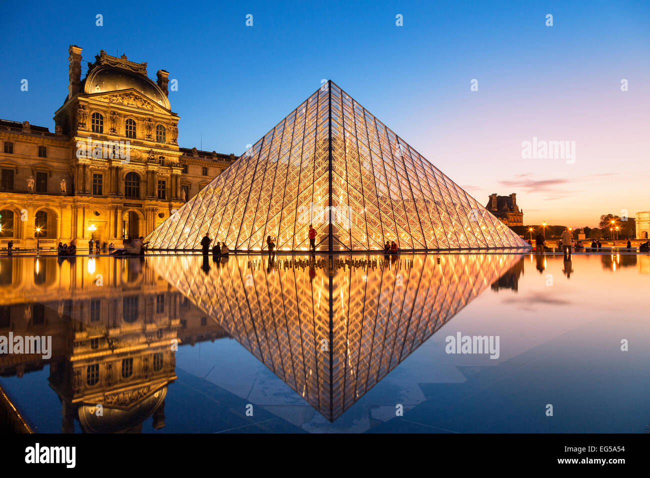 Paris, louvre pyramid at dusk Stock Photo