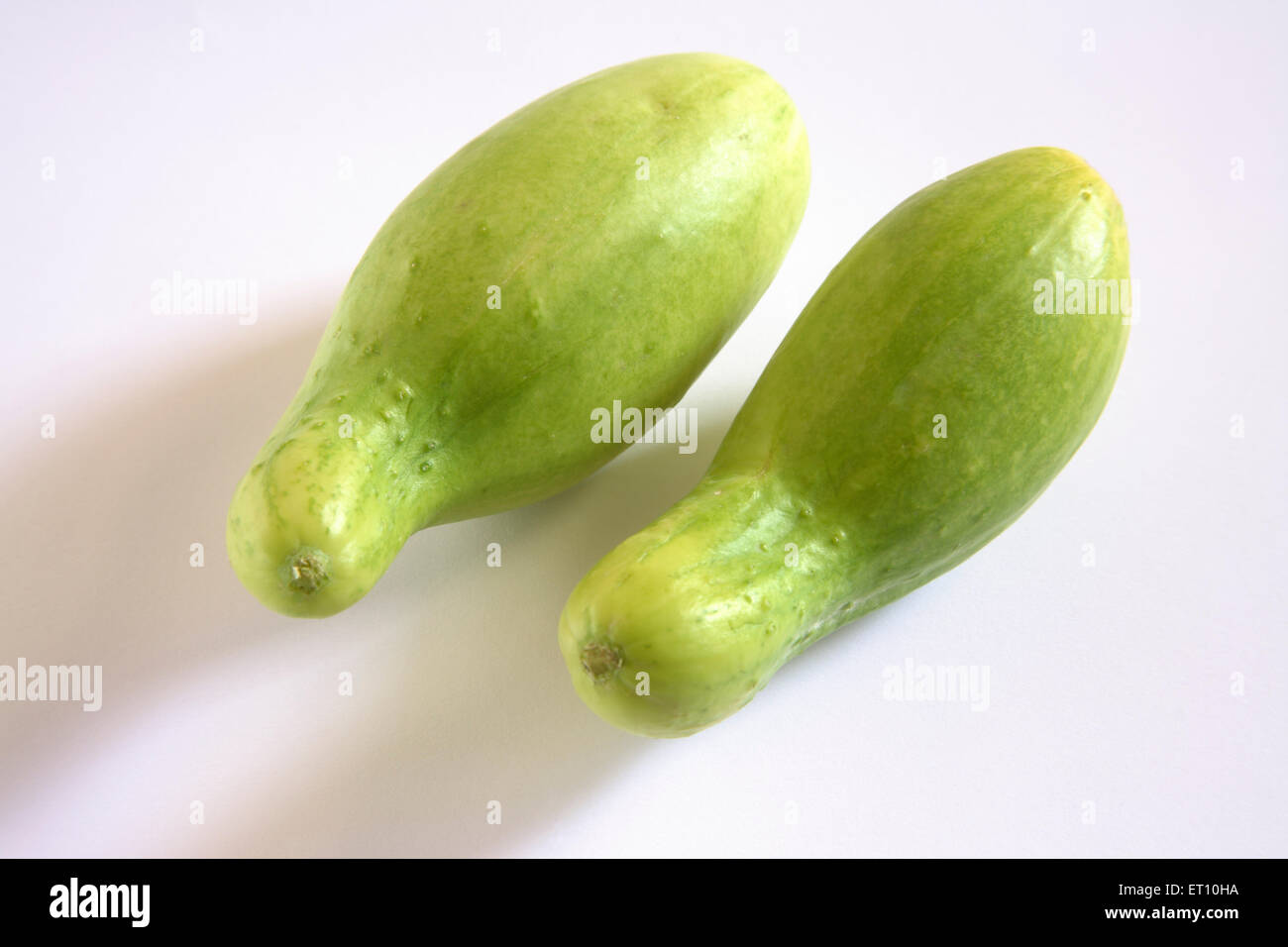 Green vegetable ; kakri cucumbers cucumis utilissimus on white background Stock Photo