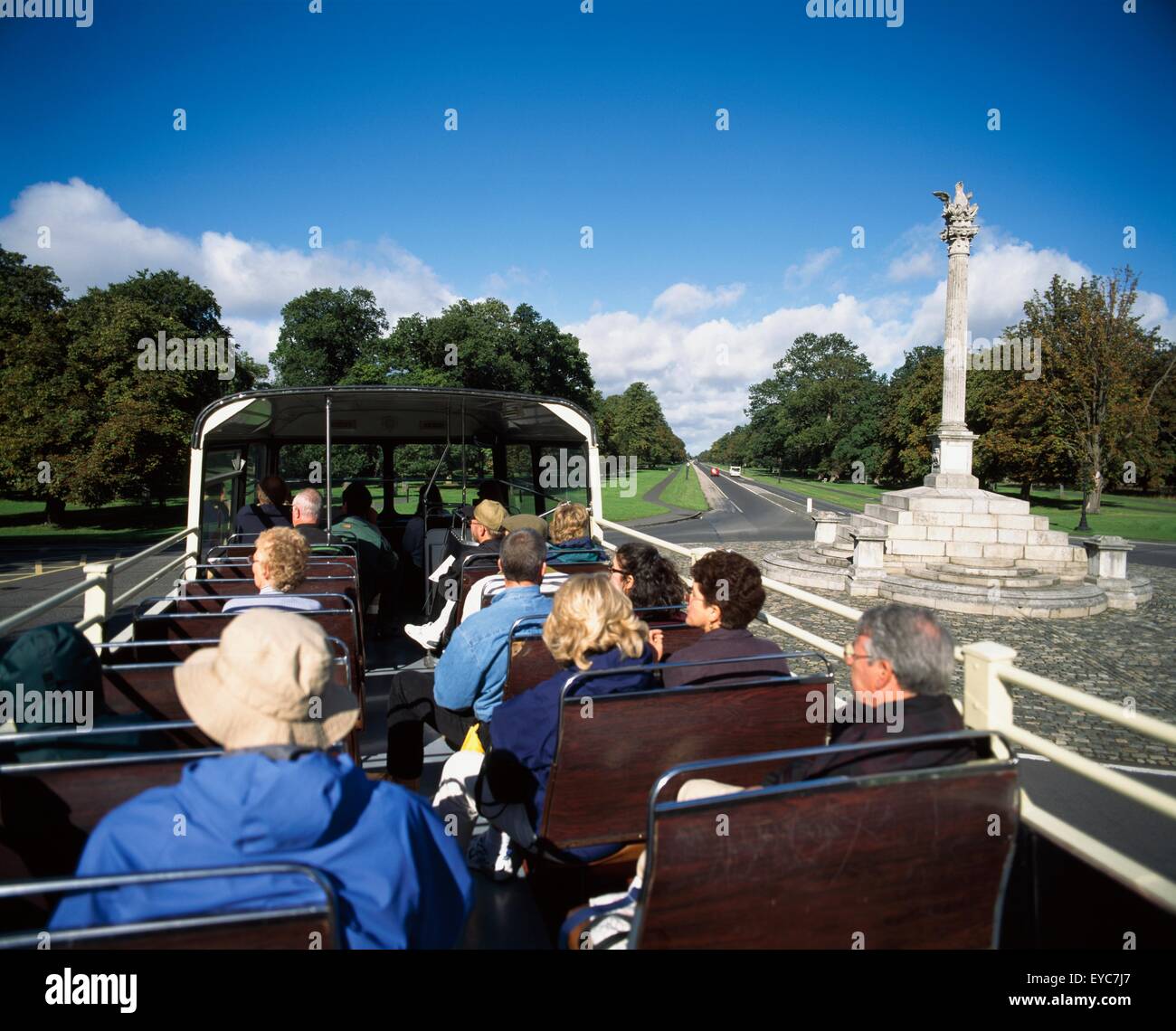 Phoenix Column, Phoenix Park, Dublin City, Ireland; Tourists On Open Top Bus Viewing Monument In Park Stock Photo