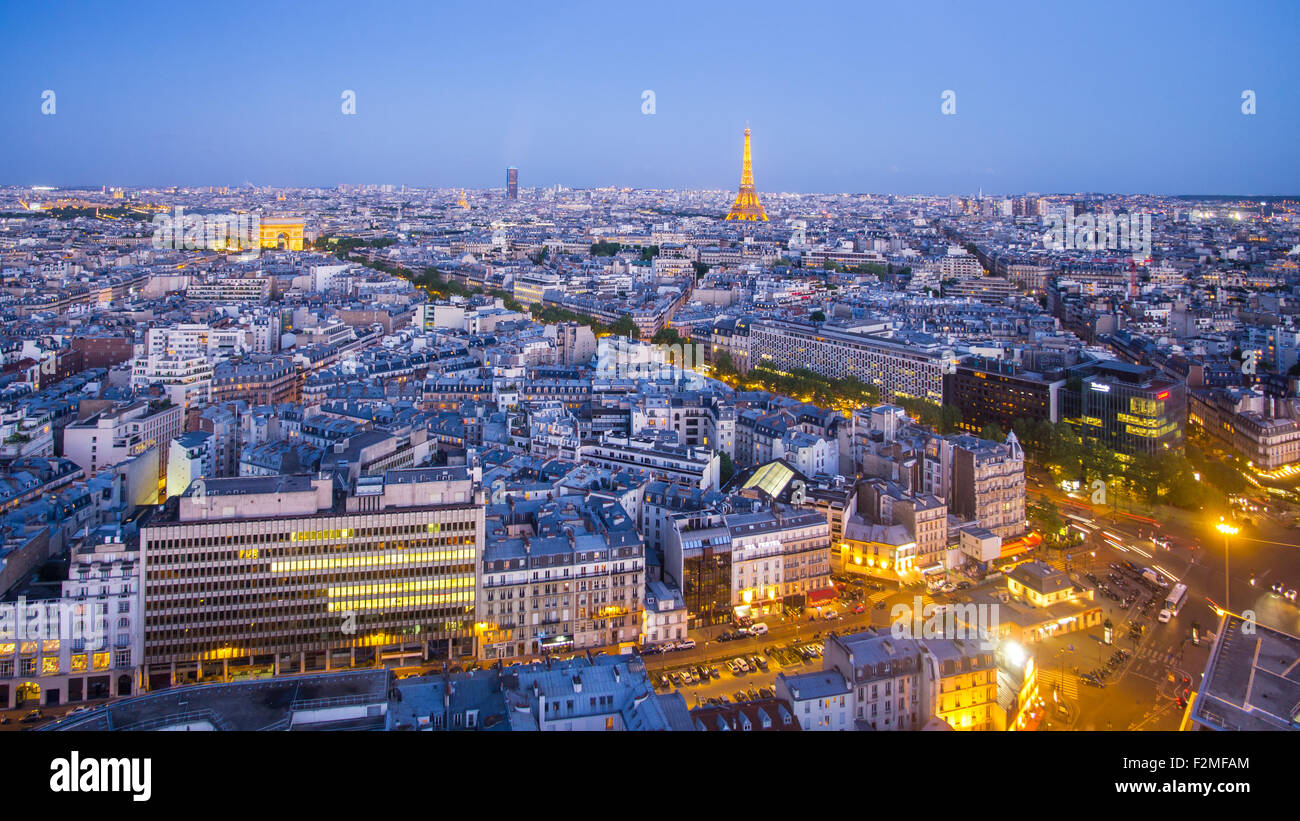 Paris City Skyline, Arc de Triomphe and the Eiffel Tower, viewed over rooftops, Paris, France, Europe Stock Photo