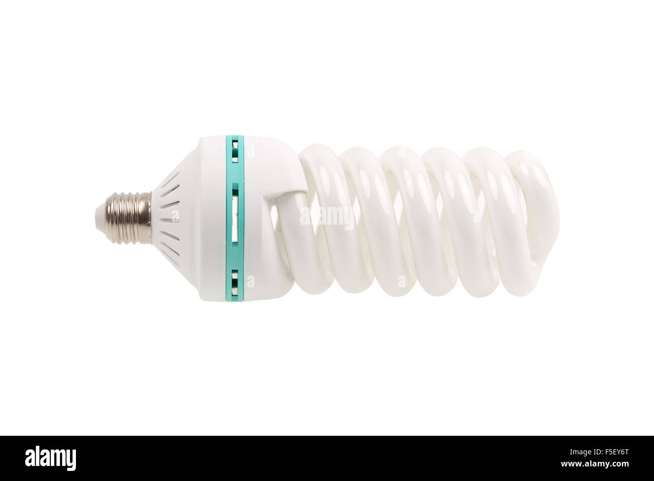 A green light bulb energy saving isolated on white background. A spiral fluorescent lightbulb low power consumption. Stock Photo