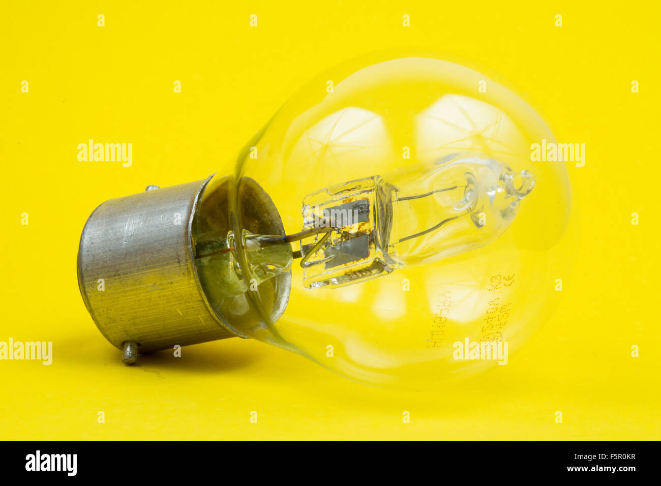 A light bulb on a yellow background. Stock Photo