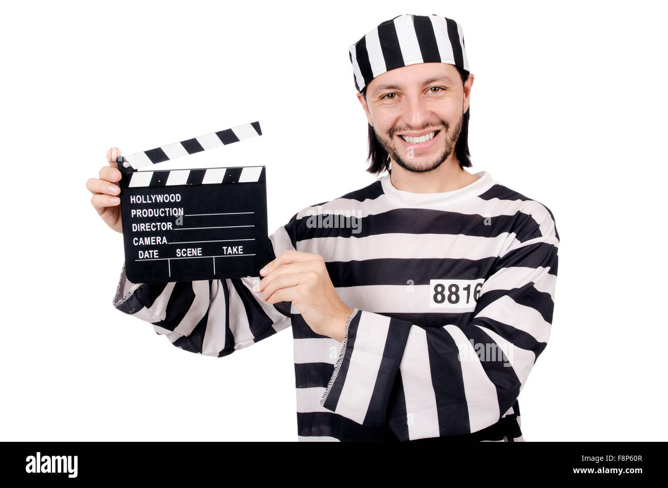 Funny prison inmate with movie board isolated on white Stock Photo