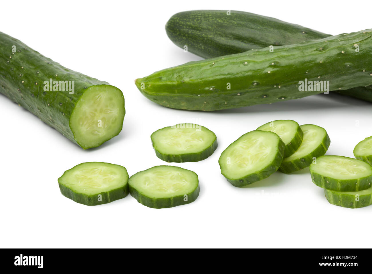 Japanese cucumbers and slices on white background Stock Photo