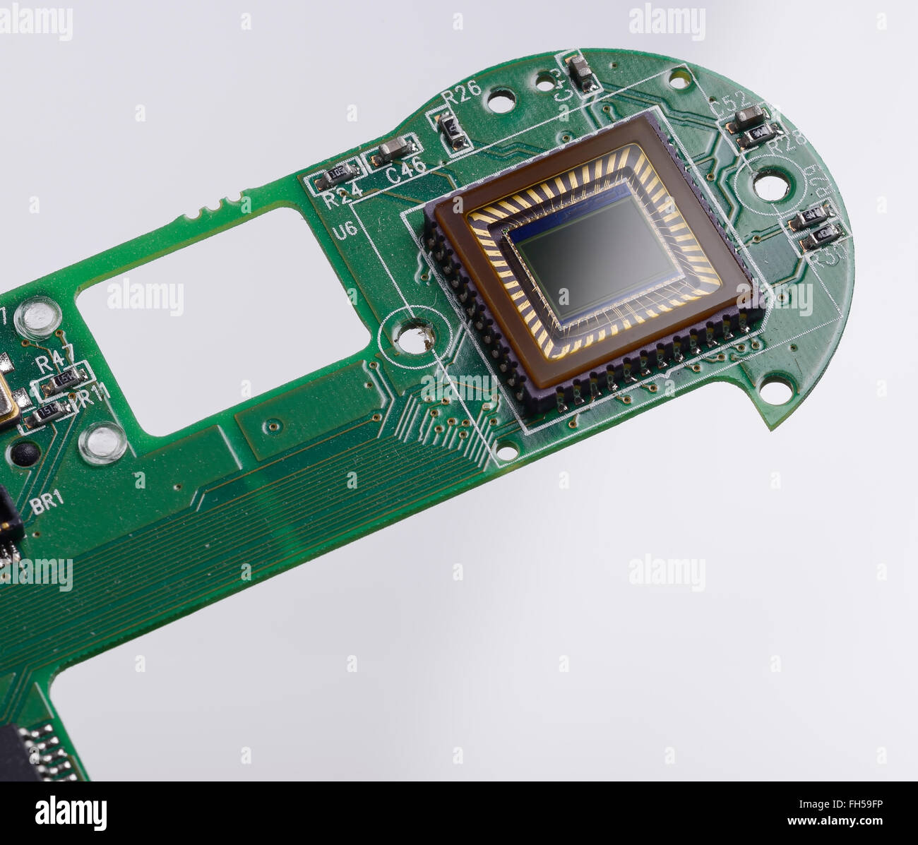 The imaging sensor and circuit board from a compact digital camera Stock Photo