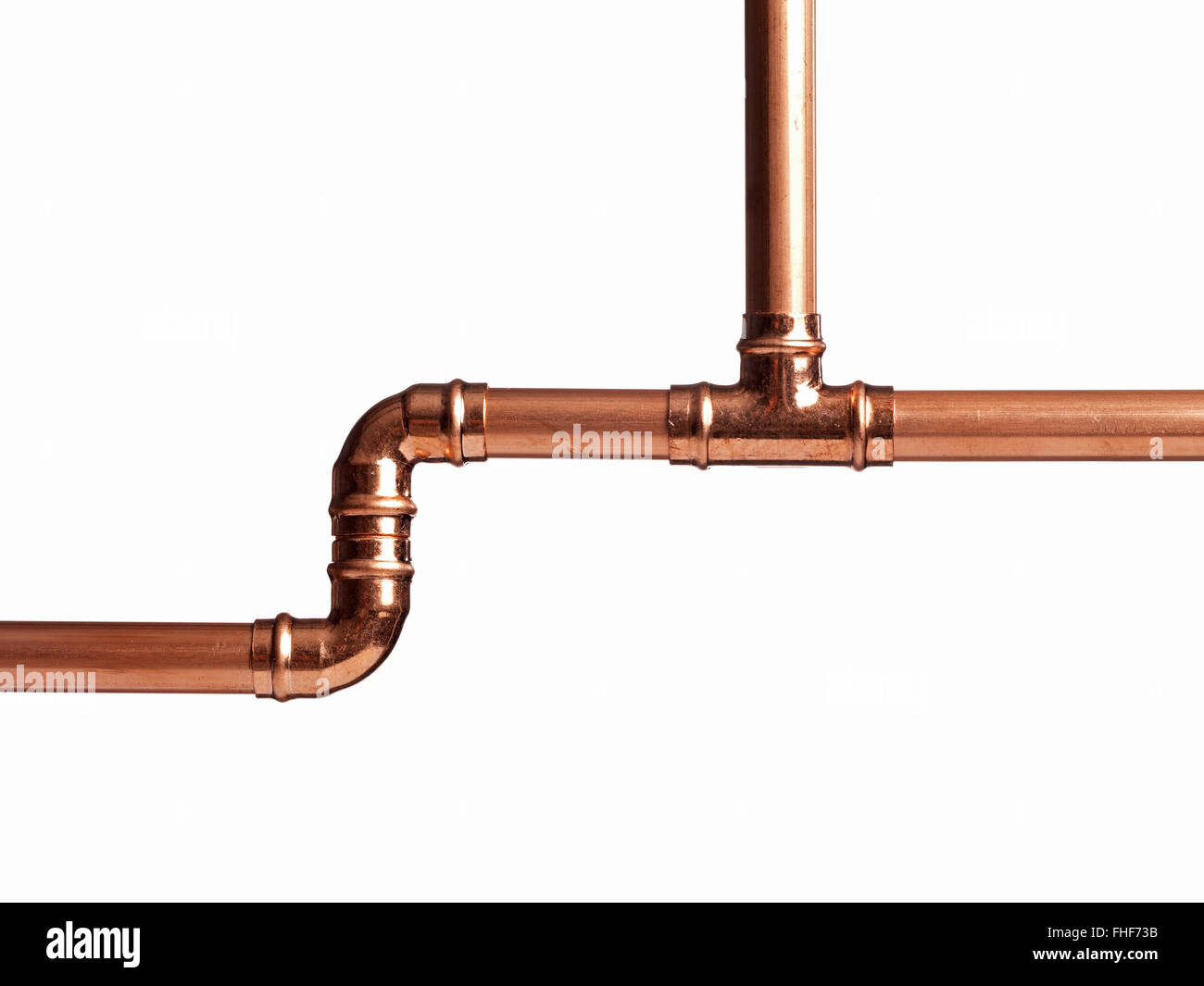 Copper pipe on white with connector Stock Photo