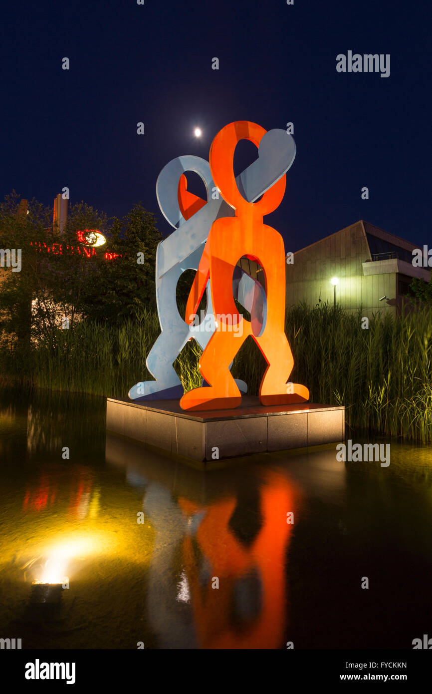 Sculpture 'Untitled', 'The Boxers' by Keith Haring, Eichhornstraße street, Potsdamer Platz square, Berlin, Germany Stock Photo