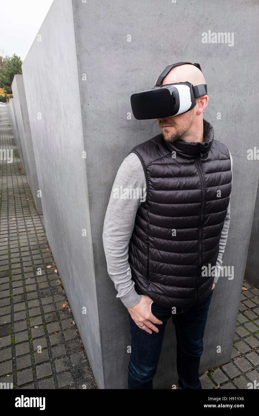 Man wearing VR virtual reality headset in Berlin Germany Stock Photo