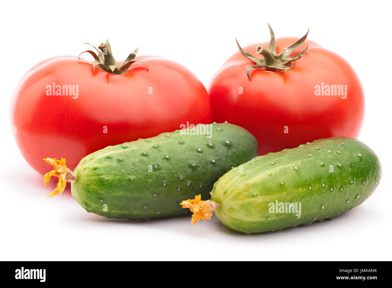 Tomatoes and cucumbers isolated  Stock Photo