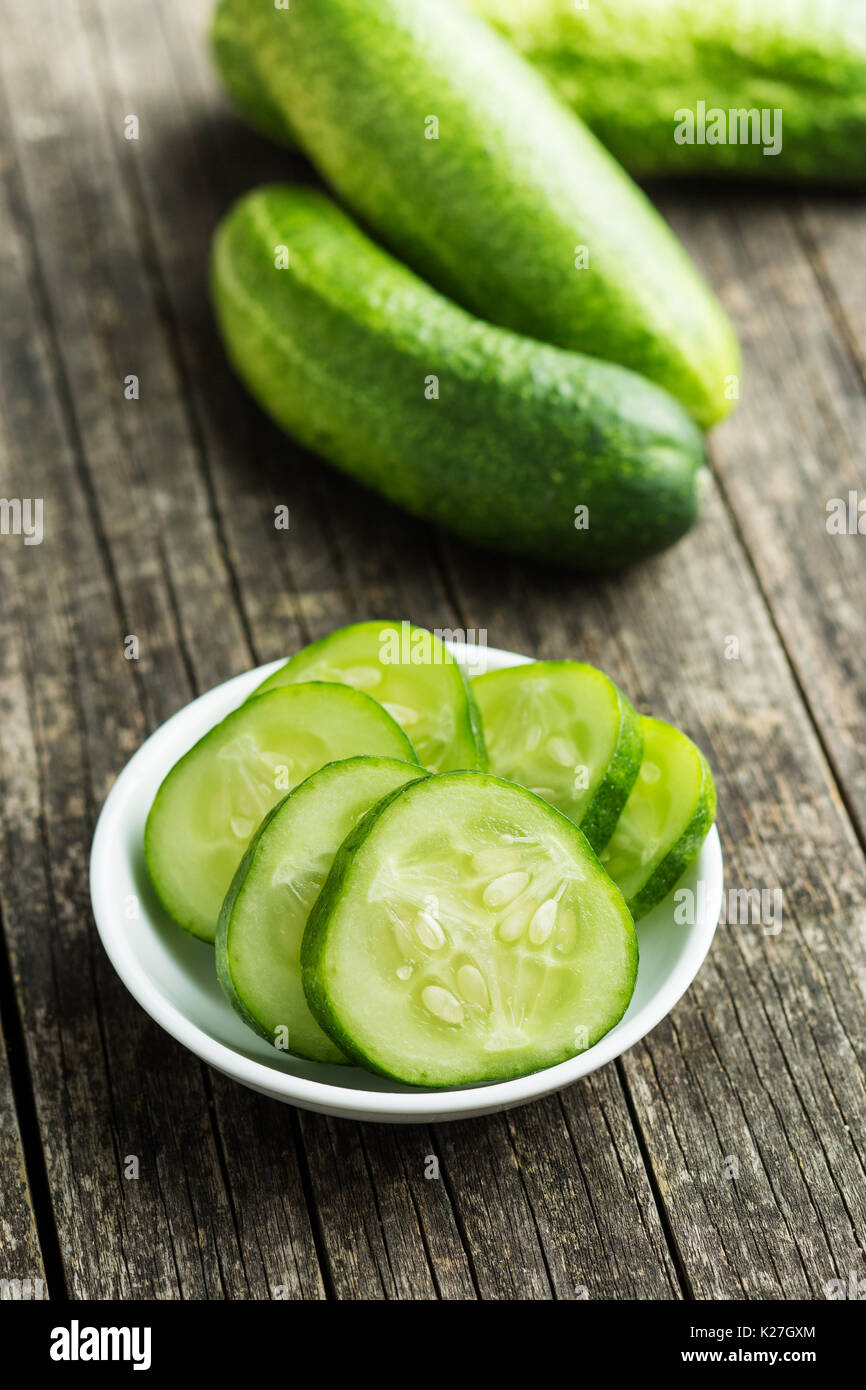 Sliced green cucumbers. Cucumbers in bowl. Stock Photo