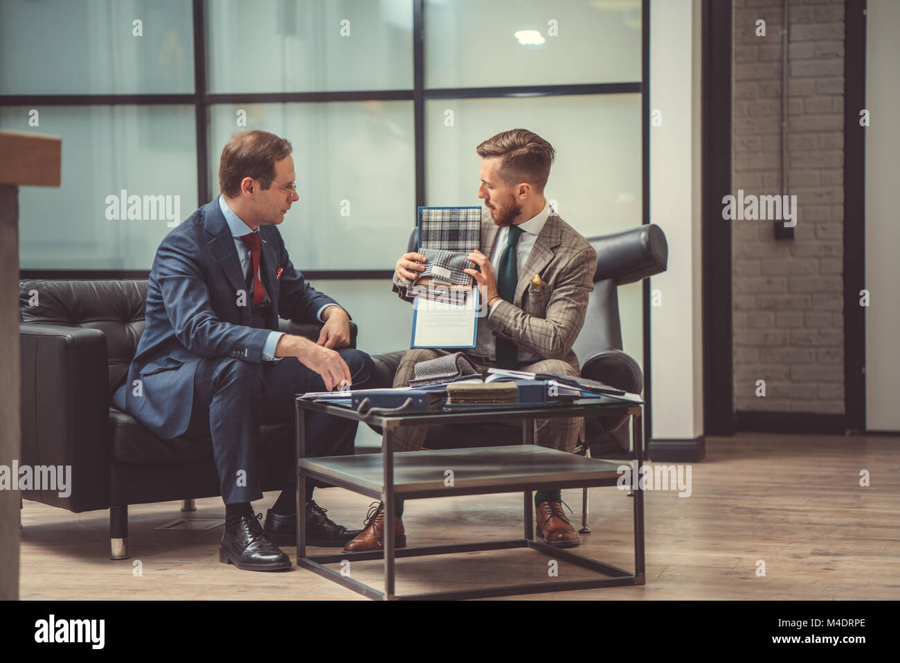 Businessmen at meeting Stock Photo