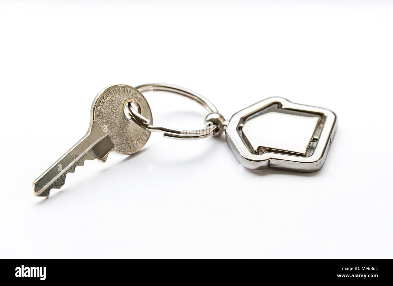 House key on a keyring with house design Stock Photo