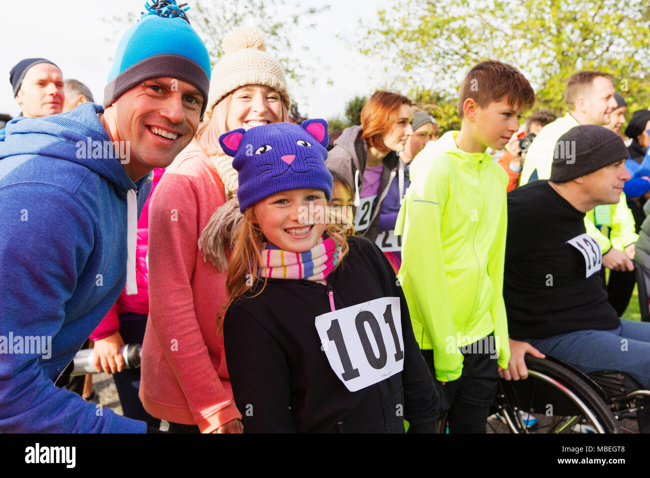 Portrait smiling family runners at charity run Stock Photo