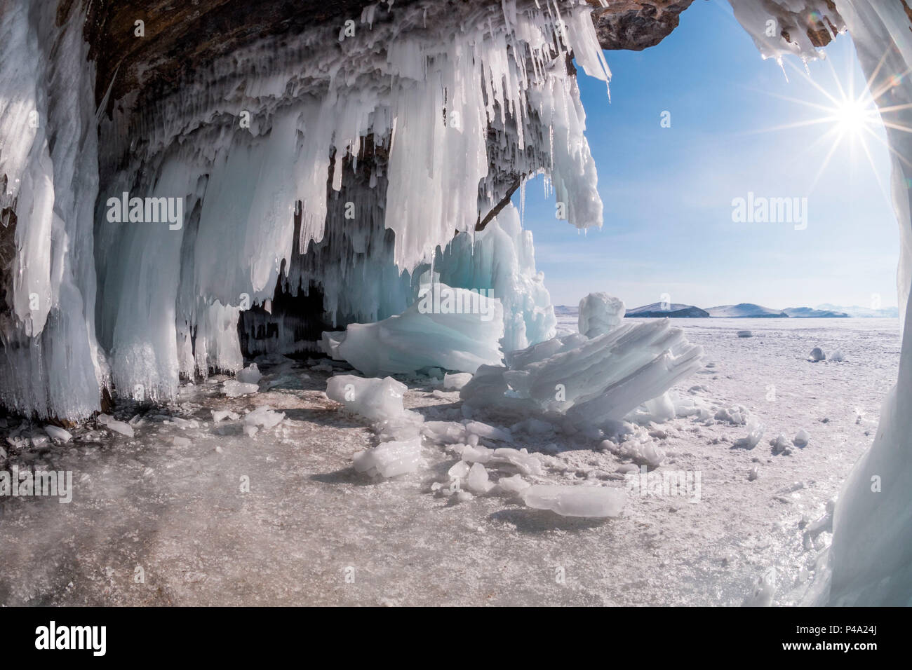 Ice stalactites in a cave at the shore of lake Bajkal, Irkutsk region, Siberia, Russia Stock Photo