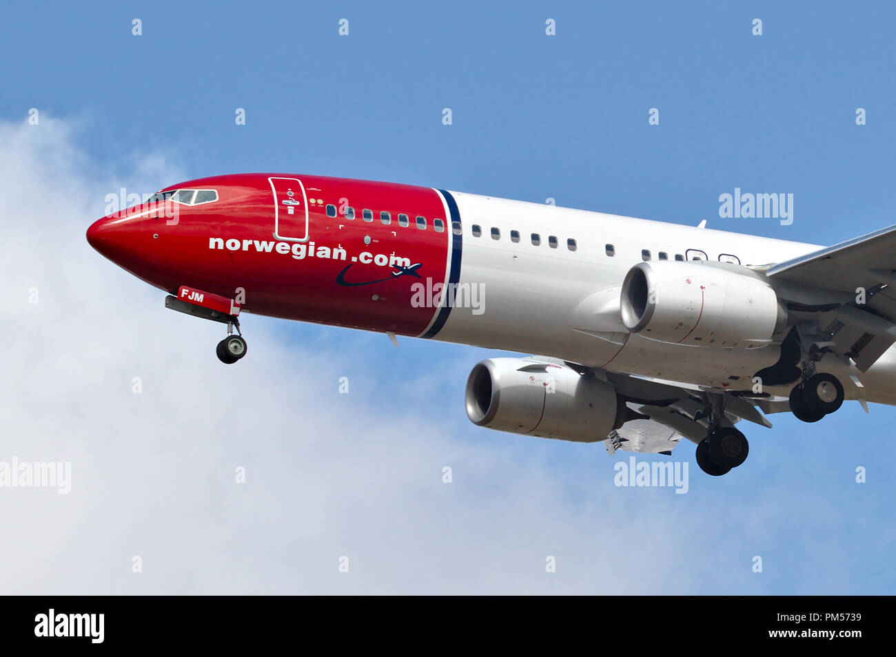 Norwegian airlines aircraft preparing to land Helsini-Vantaa airport in Finland. Planes cockpit and engines visible, no tail or wings. Picture taken o Stock Photo