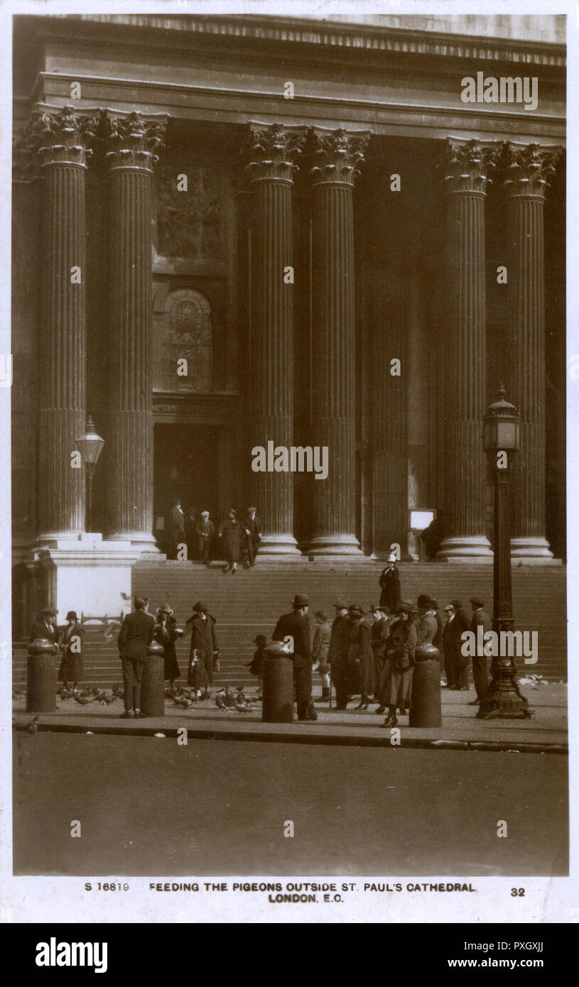 Feeding the Pigeons Outside St Paul's Cathedral, London Stock Photo