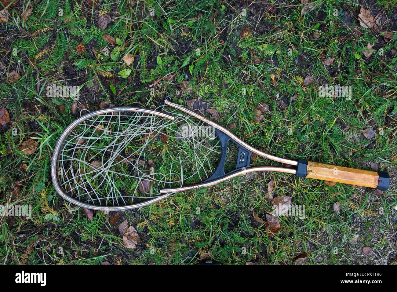 broken tennis racket Stock Photo