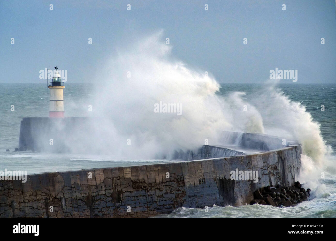 Newhaven, East Sussex. 29th November 2018. Strong winds continue along the south coast bringing with it large waves to Newhaven harbour. Credit: Peter Cripps/Alamy Live News Stock Photo