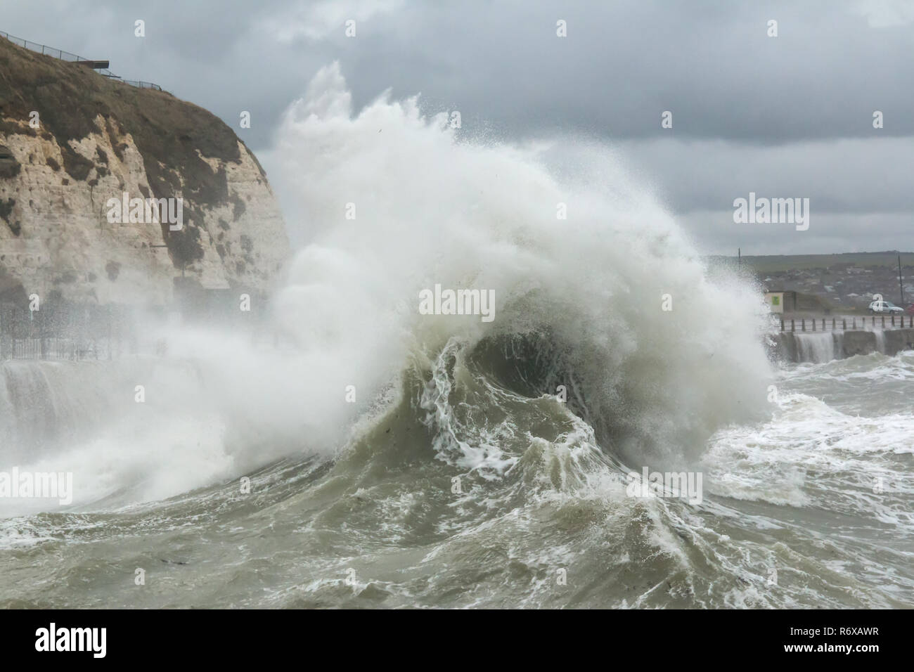 Waves and spray in Newhaven Harbour, Sussex. Stock Photo