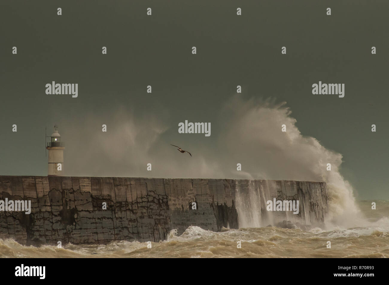 Newhaven, East Sussex, UK. 7 December 2018..Stormy conditions at the harbour West arm as strong wind from the West whips up the waves. Stock Photo