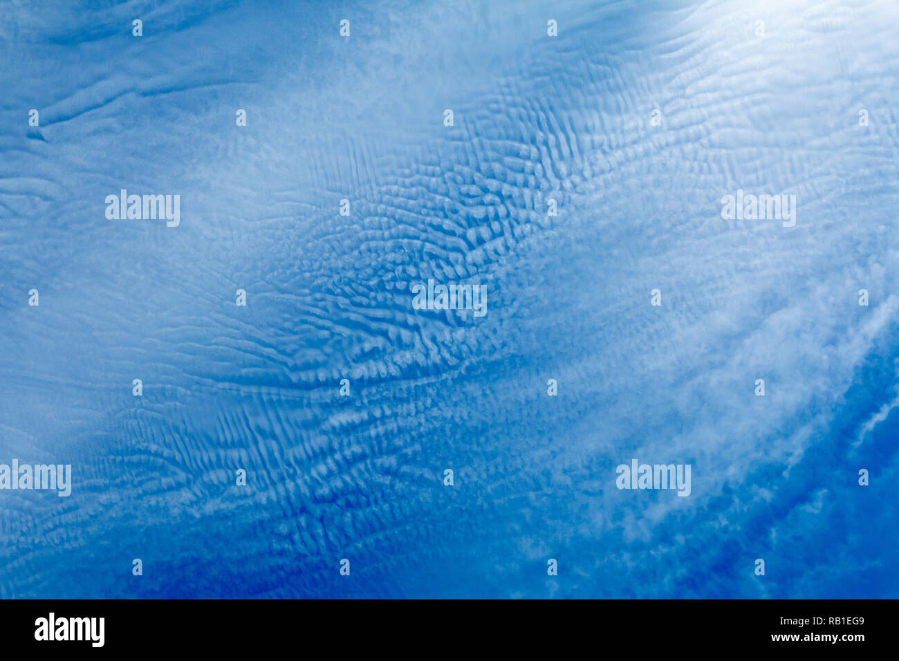 Looking up to a Mackerel sky, a cloud formation that looks like fish scales Stock Photo