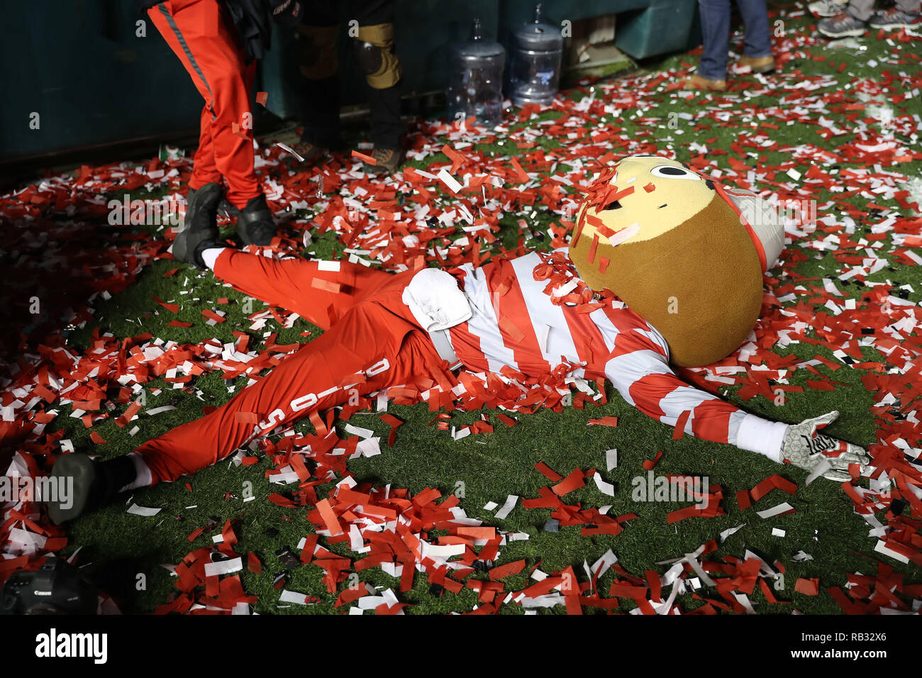 January 1, 2019: The Ohio State mascot Brutus makes snow angels in the confetti after the game between the Ohio State Buckeyes and the Washington Huskies at The Rose Bowl Game, The Rose Bowl in Pasadena, CA. (Photo by Peter Joneleit) Stock Photo