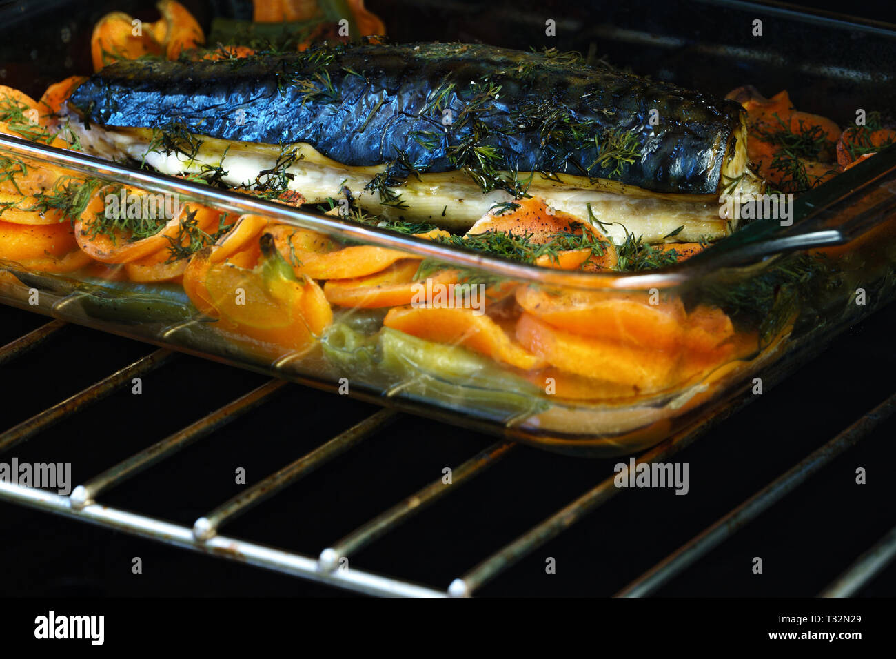 Close Up Freshly Baked Mackerel Fish with Vegetables Stock Photo