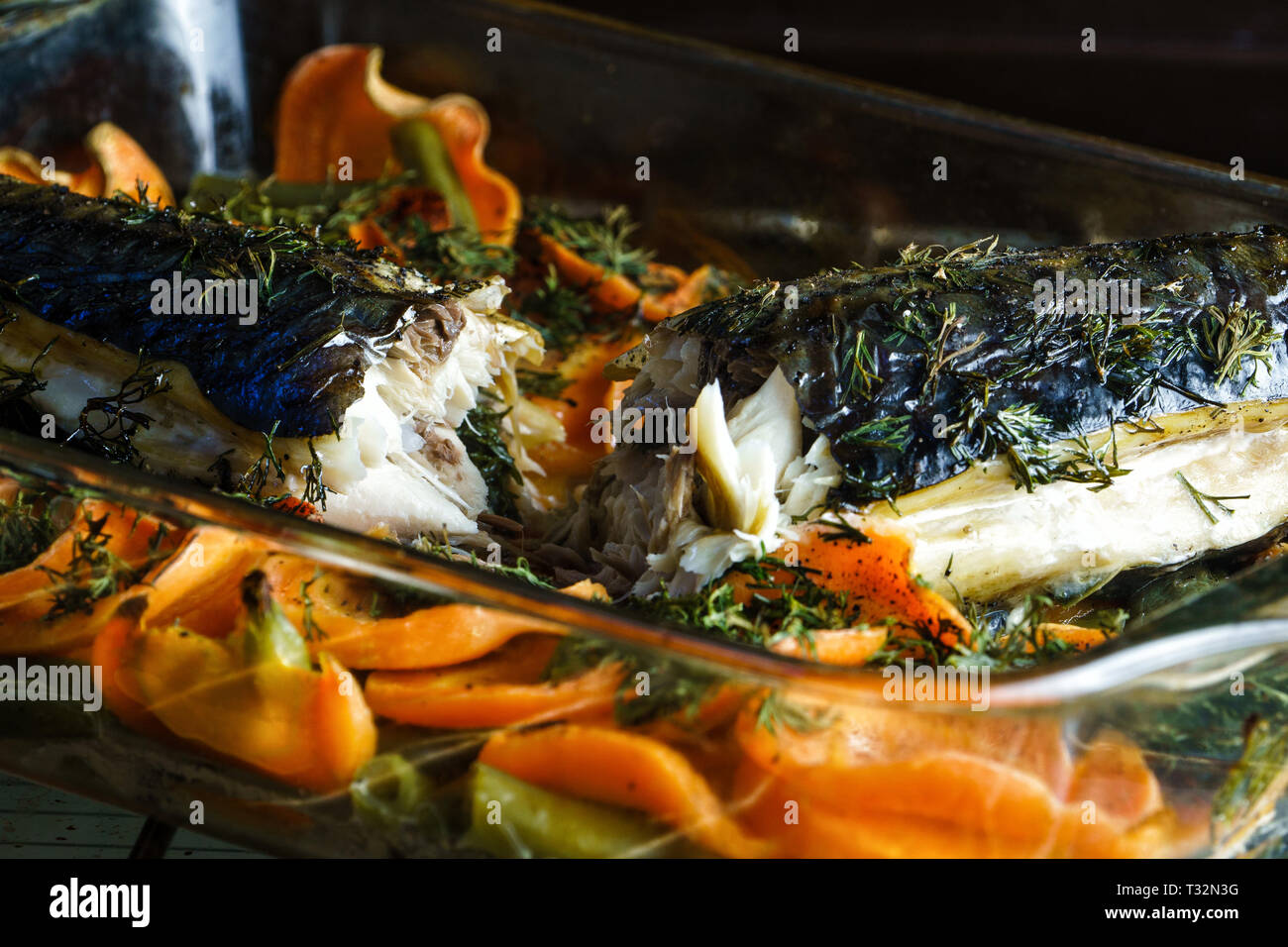 Close Up Freshly Baked Mackerel Fish with Vegetables Stock Photo