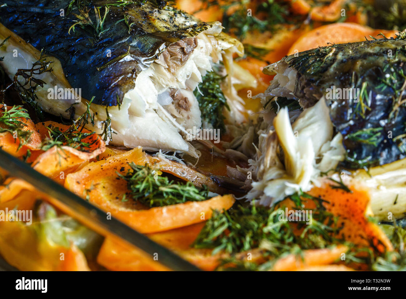 Close Up Freshly Baked Mackerel Fish with Vegetables Stock Photo